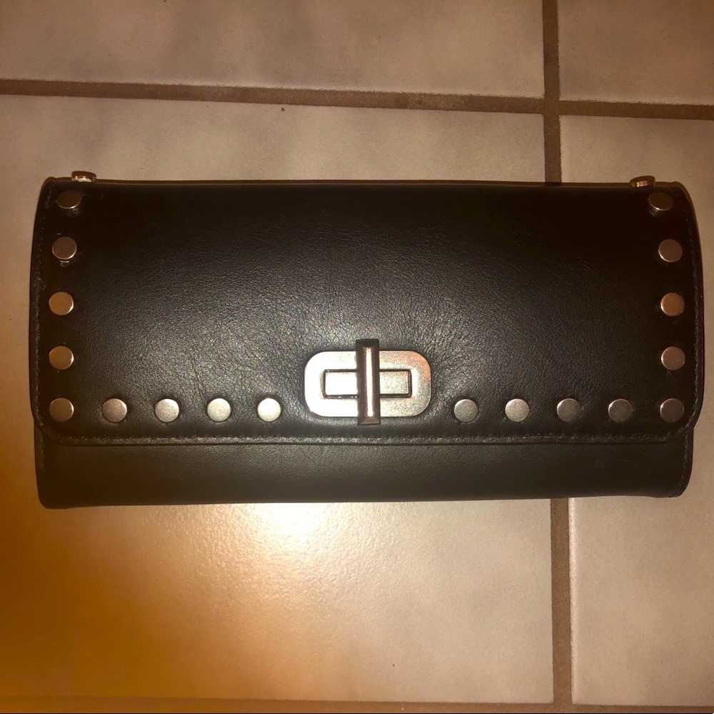 Michael Kors black wallet with silver studs.